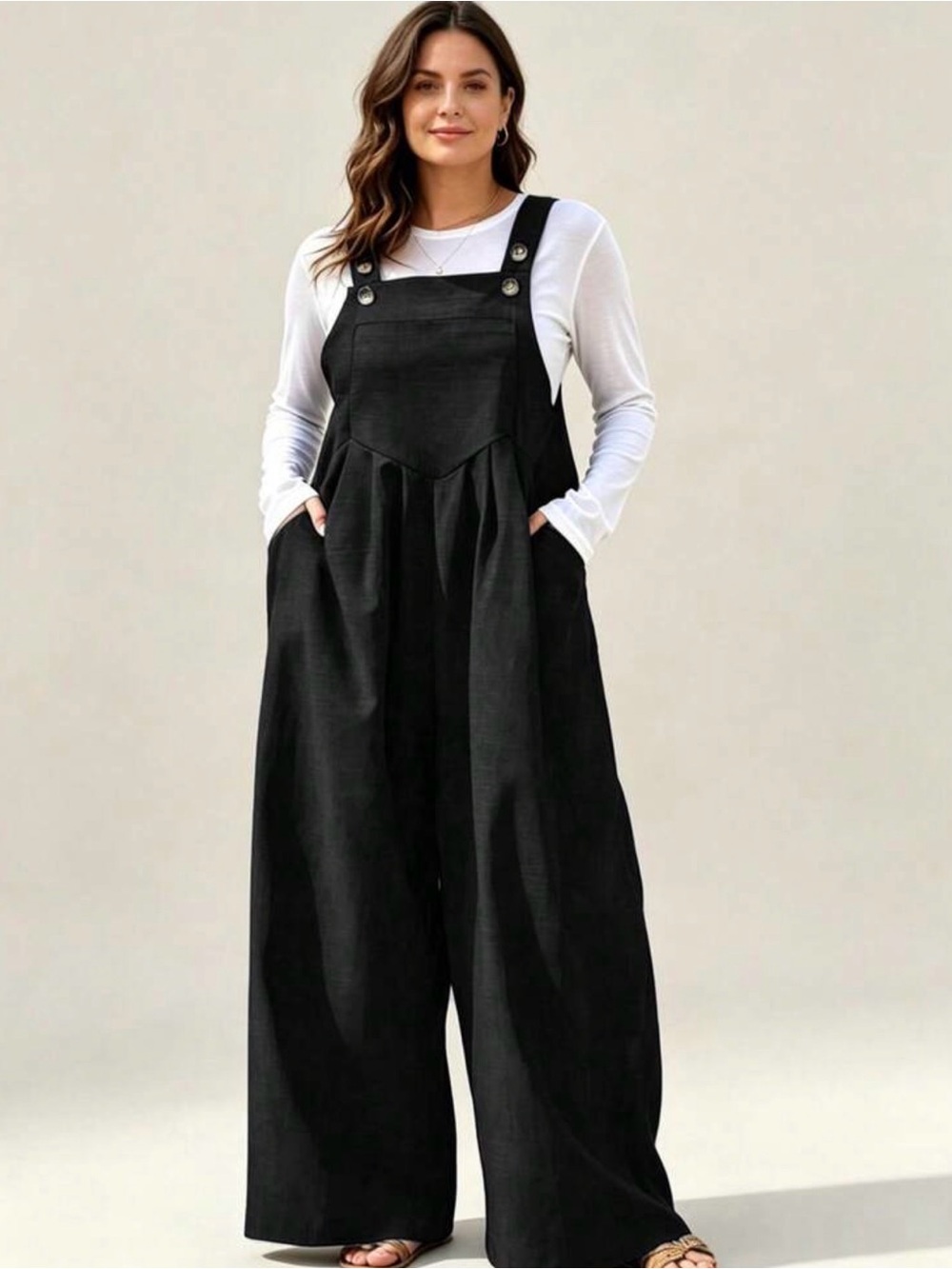 Black Sleeveless Jumpsuit/ overalls with adjustable button straps and pockets. - Picture 2 of 5
